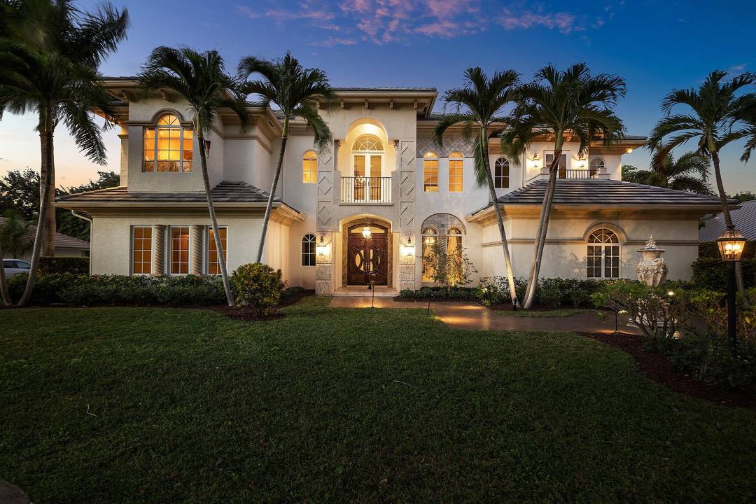 Your next home is a Magnificent Estate nestled in the prestigious gated community of Pine Tree Golf Club.
