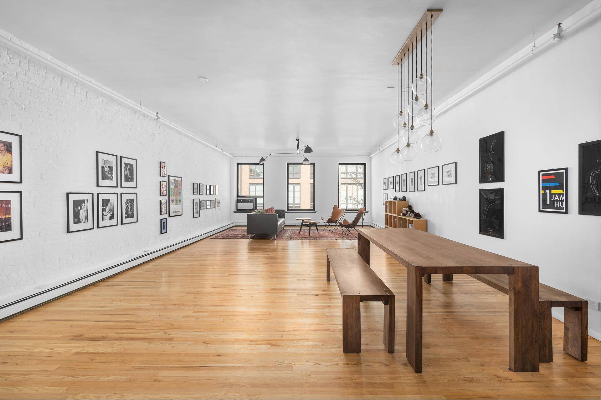 Spanning nearly 1, 700 sq ft, this full floor, true three bedroom loft has it all triple exposure, a vented washer dryer, and exposed brick just to name a few.