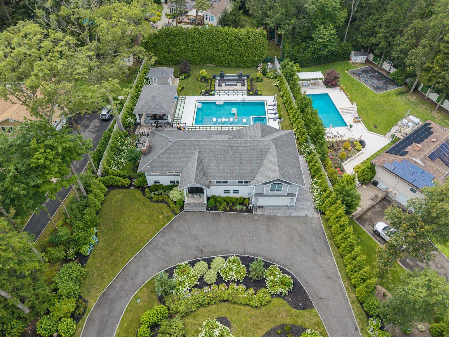 Welcome to 22 Beaumont Drive a truly one of a kind 4, 800 square foot expanded contemporary masterpiece, fully renovated in 2022 and designed for luxury living and unforgettable entertaining.
