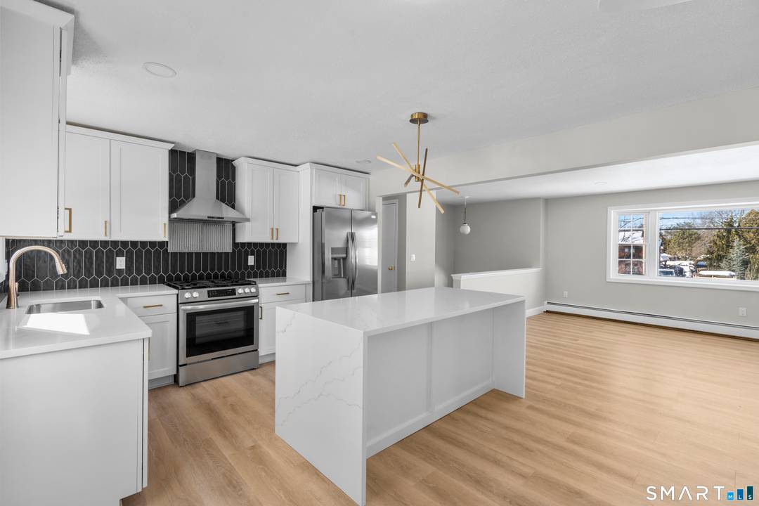 Welcome to 534 Rye Street, South Windsor a beautifully reimagined home where modern upgrades meet timeless comfort.