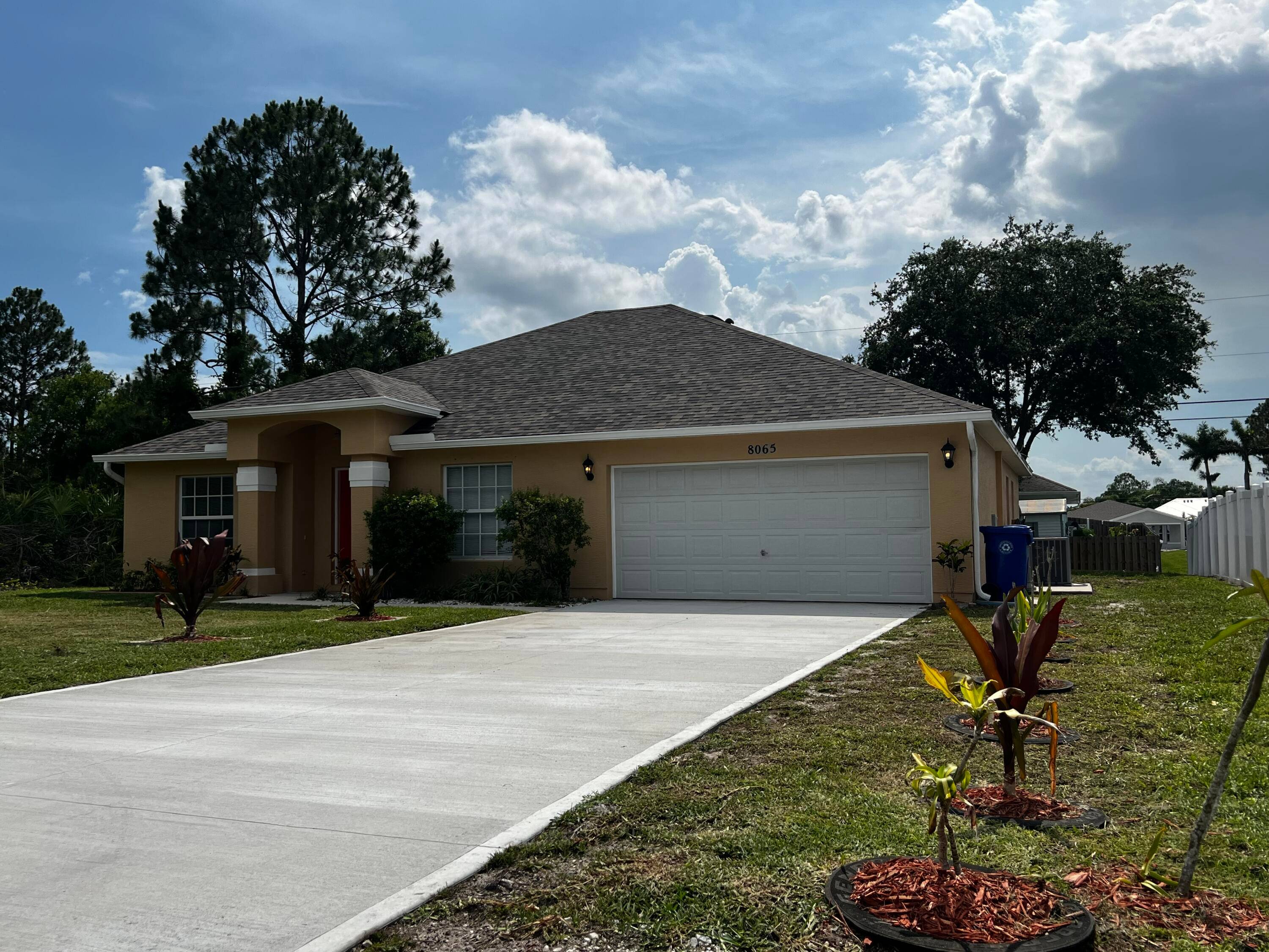 CITY WATER and REMODELLED 3 bedroom 2 bathrooms home with a separate den office, screened in porch, separate air conditioned laundry room and a two car garage.