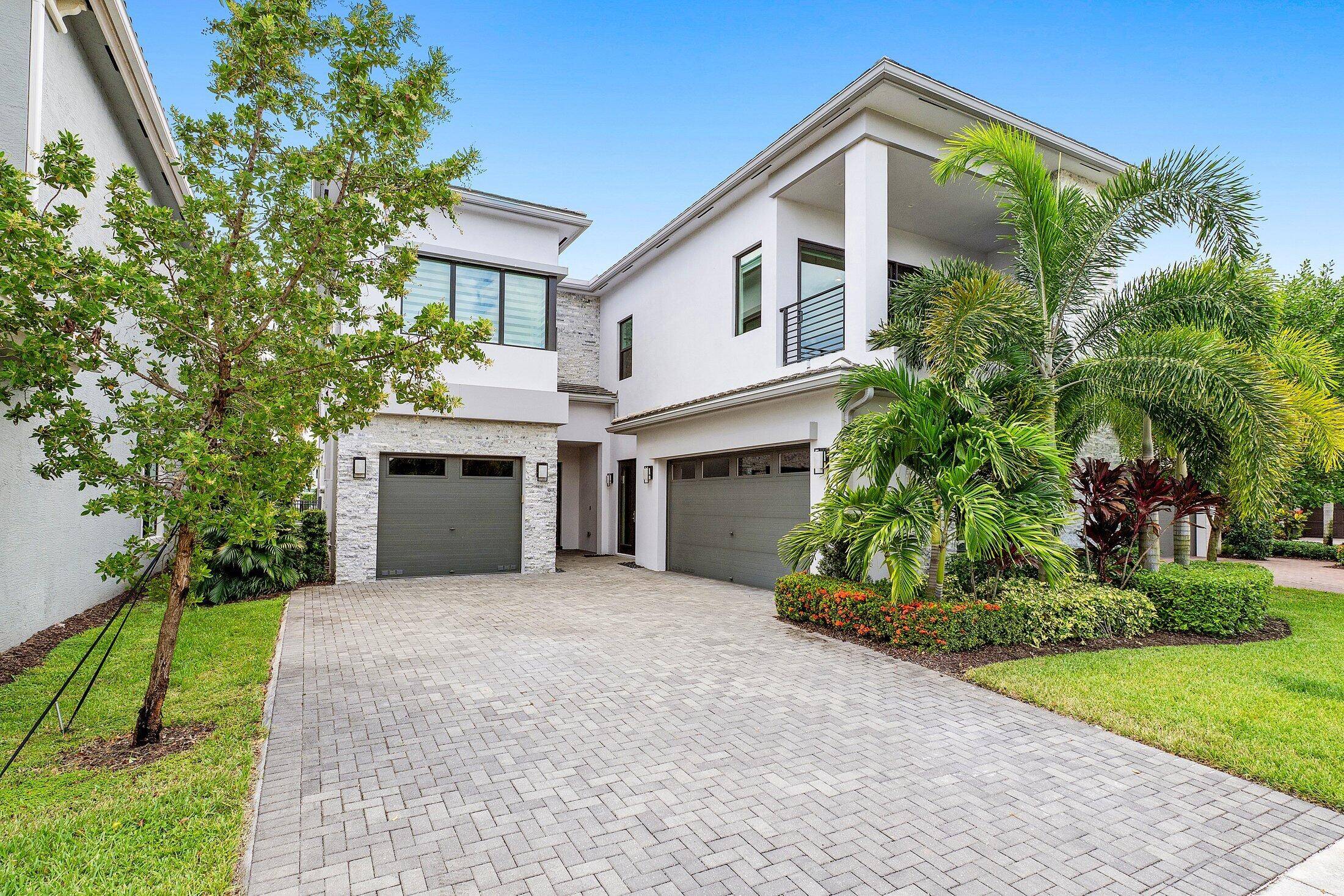Experience refined living in this stunning waterfront 5 bed, 6 bath, 3 car garage estate with a clubroom and loft.