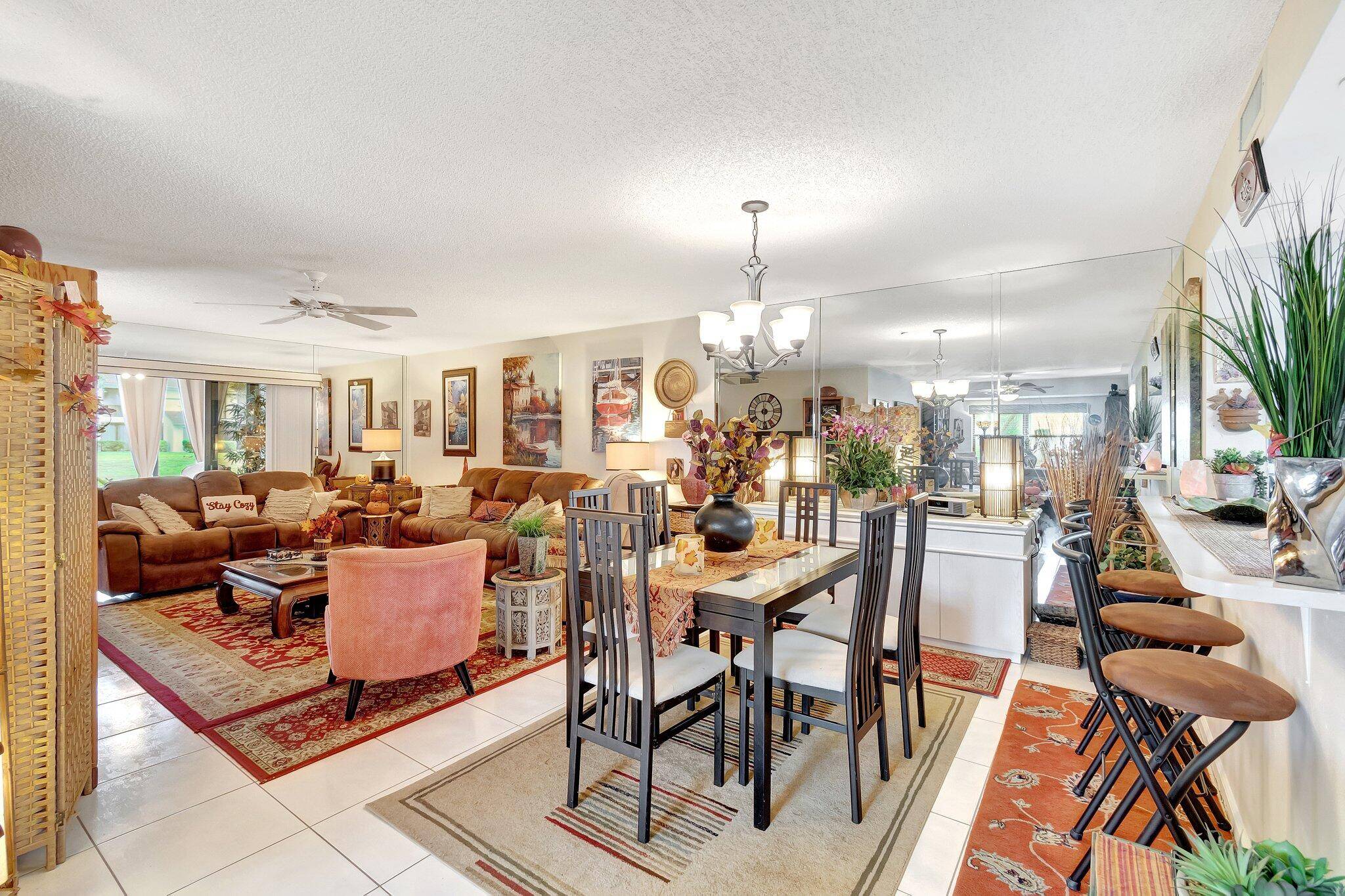 Introducing 9668 Sills Dr E 101, Boynton Beach, FL 33437, an impressive residence in the captivating, active adult Sun Valley East community.