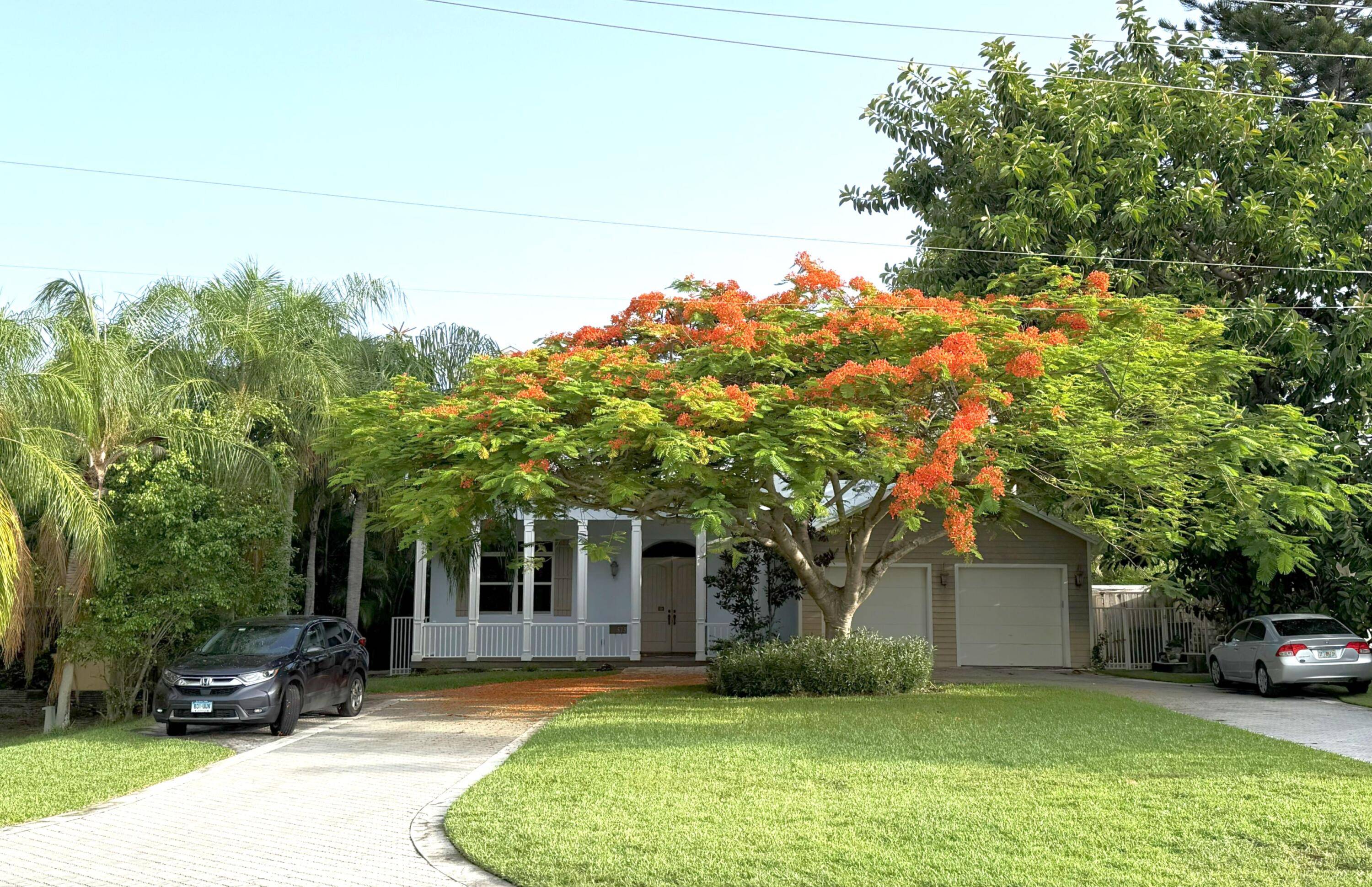 Custom newer built waterfront estate in sought after Conference Lake Estates East Boca.