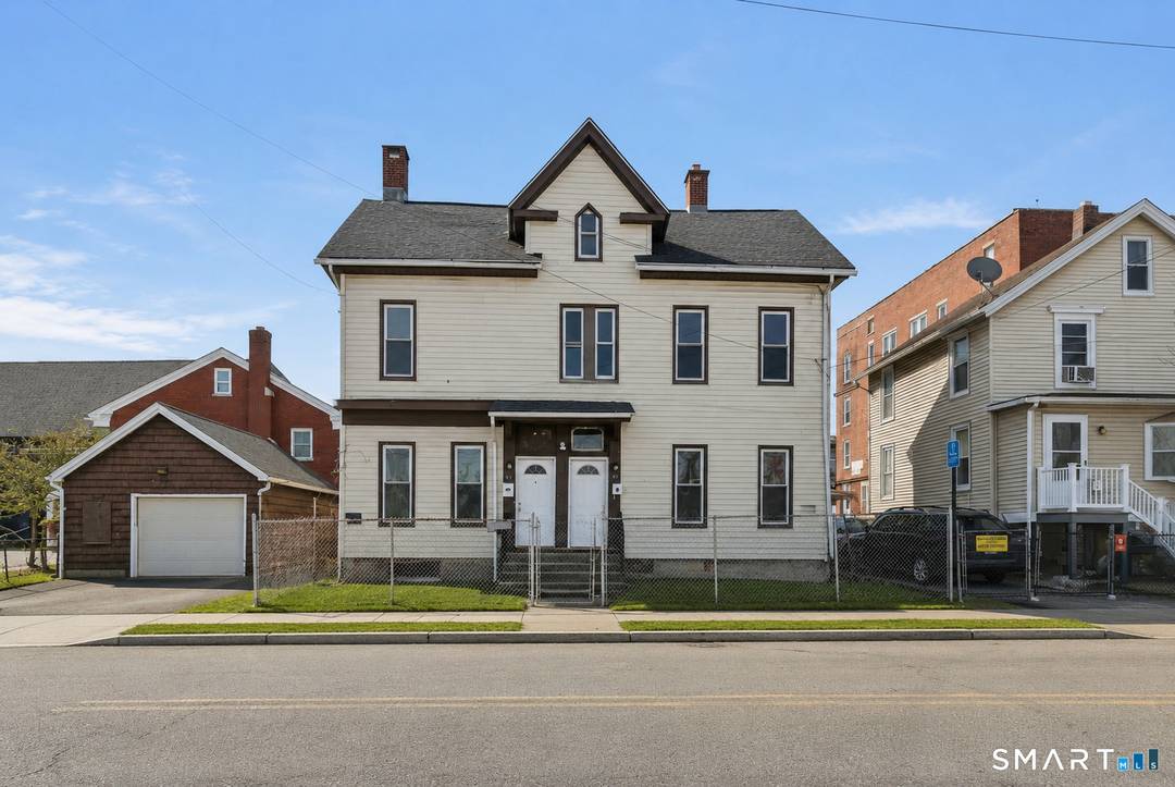 Two family property with extensive renovations completed, offering excellent income potential or a solid owner occupant opportunity.