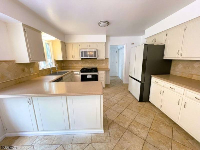 Gorgeously situated on one of Millington's quiet, private, and desirable neighborhoods.