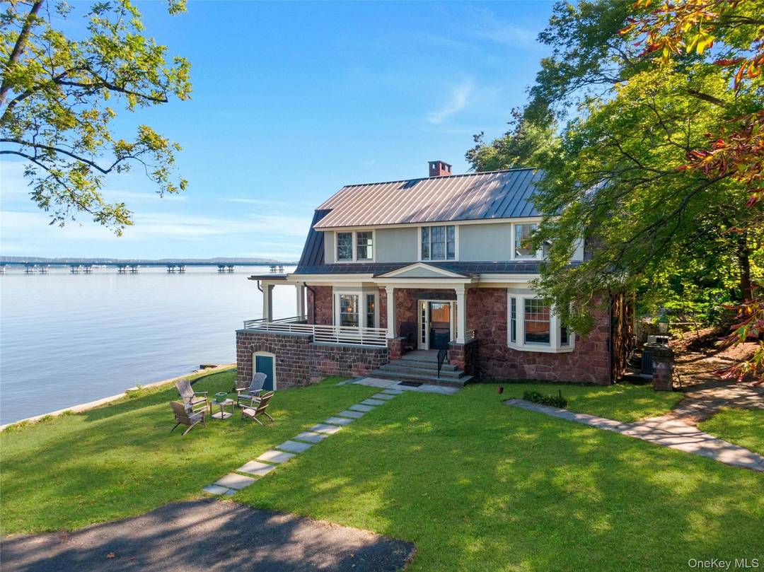 Tharp Cove the post revolutionary sandstone home, nestled along the Hudson River was the longtime home of Marie Tharp recognized as one of the greatest cartographers of the 20th century.