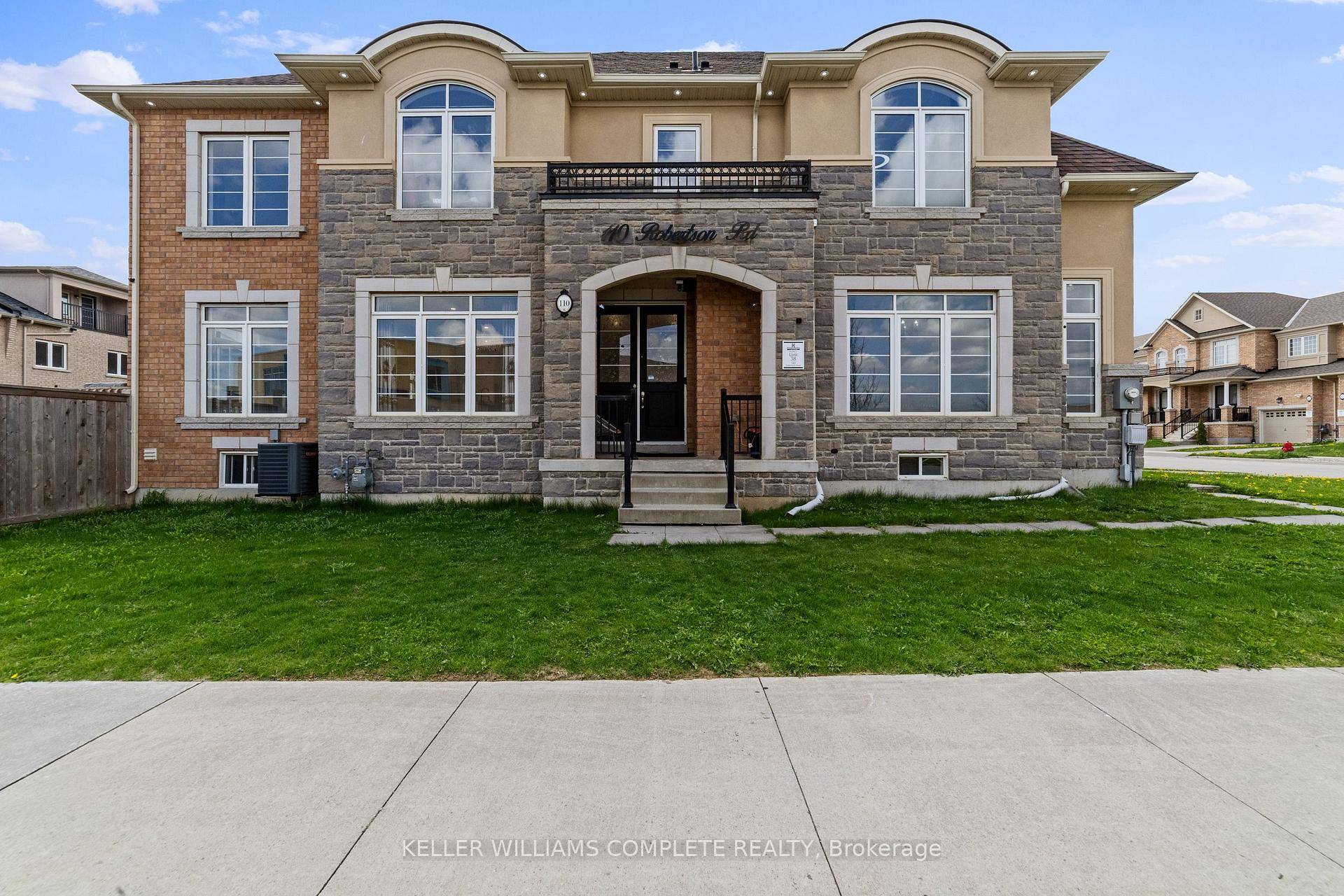 Welcome to 110 Robertson Street, a stunning end unit executive townhome nestled in one of Ancaster's most sought after, family friendly neighbourhoods.
