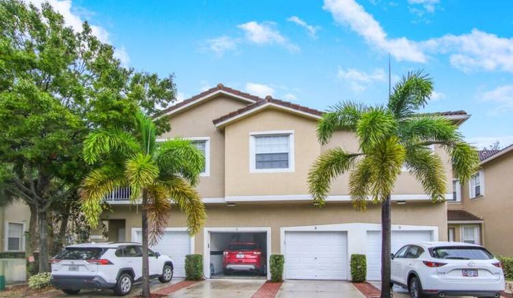 Escape to Florida living in this turnkey 3BR 2BA condo in Tequesta Trace.