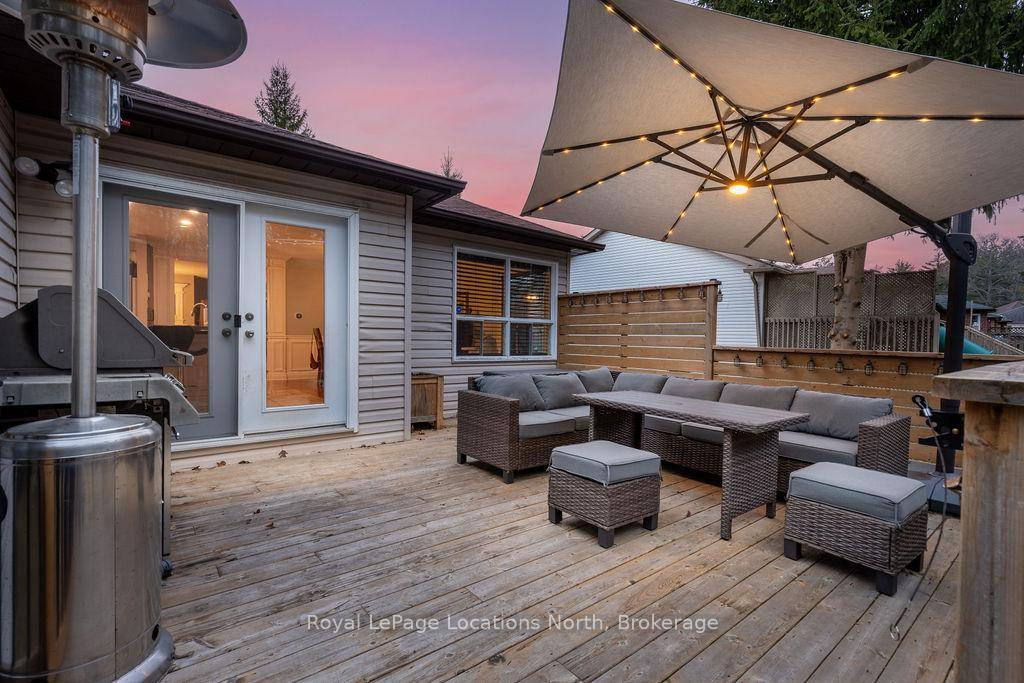 Welcome to this beautifully maintained raised bungalow, offering 3 1 bedrooms and 3 bathrooms, quietly nestled on a peaceful street and backing partially onto tranquil provincial parkland.
