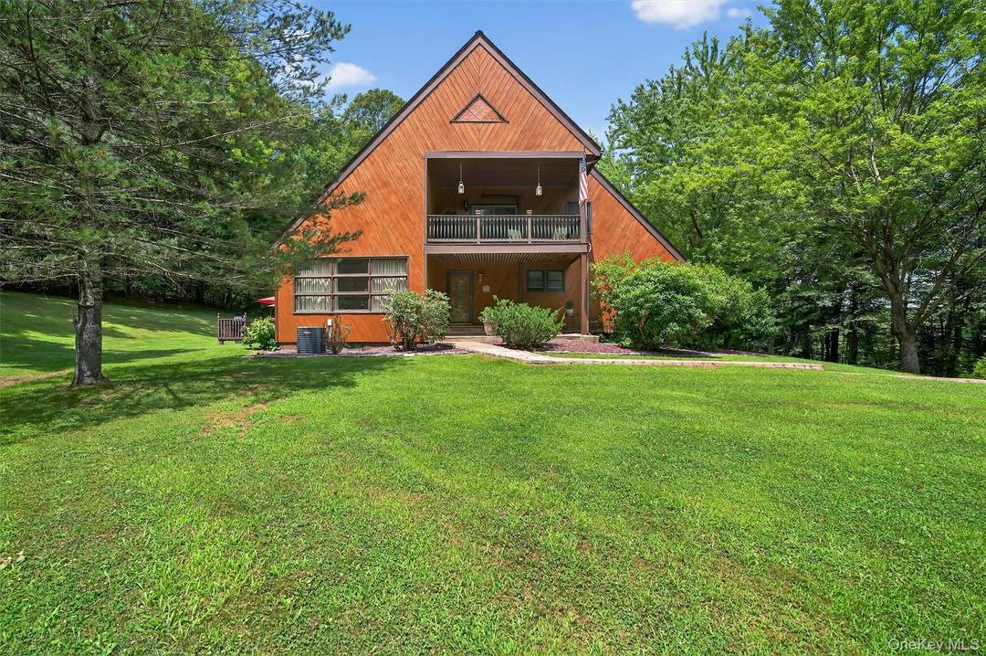 Contemporary Charm with a Unique Floor Plan and First Floor Living !