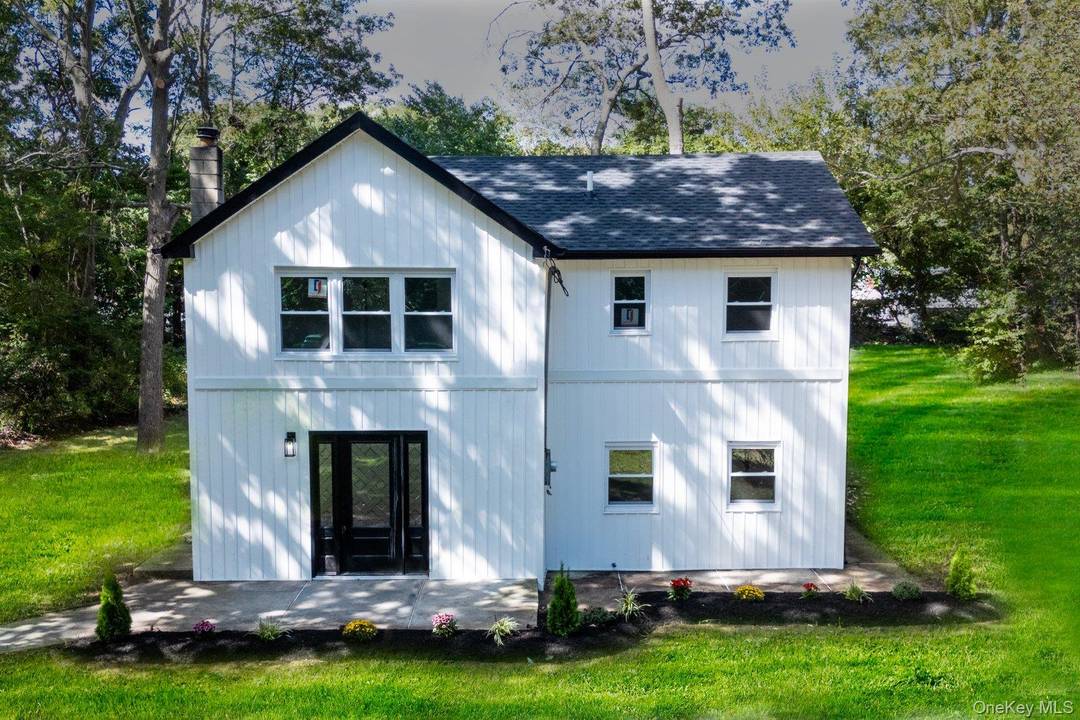 Welcome to this beautifully reimagined Colonial style residence, where timeless architecture meets modern sophistication.