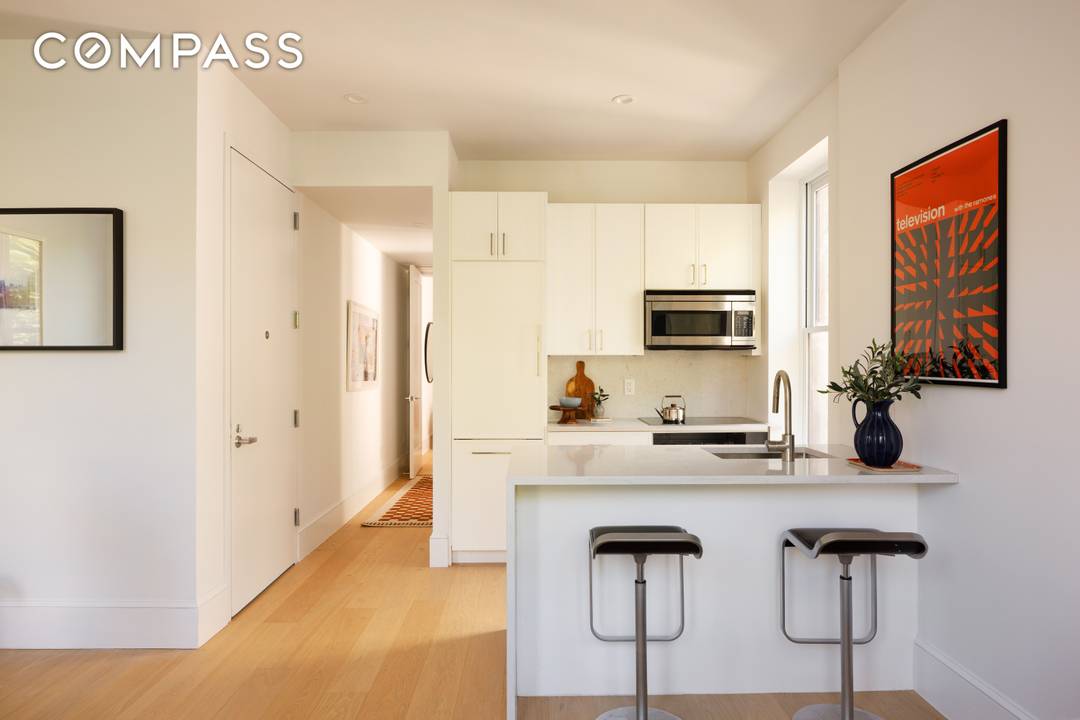 Photos are of a model residence within the building and reflect a different layout ; all finishes are identical.