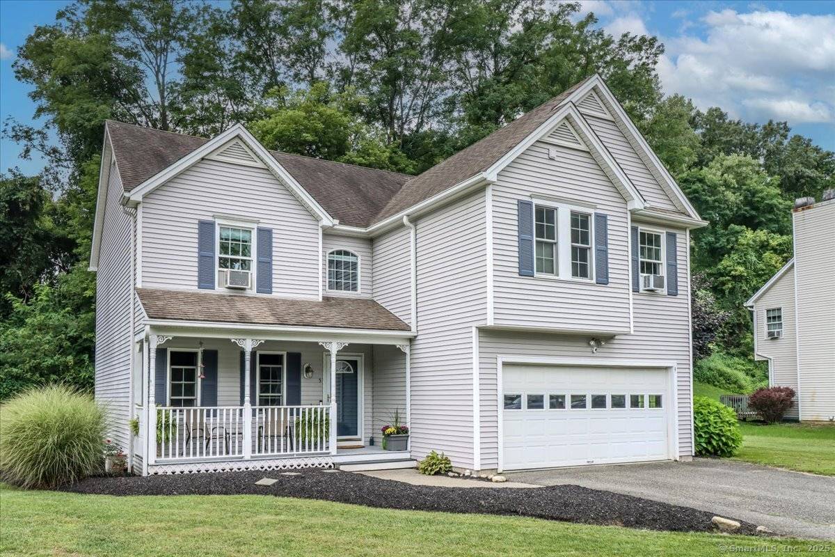 Welcome to this 2002 built Colonial Farmhouse, perfectly situated on a quiet cul de sac in one of the area's most desirable neighborhoods.