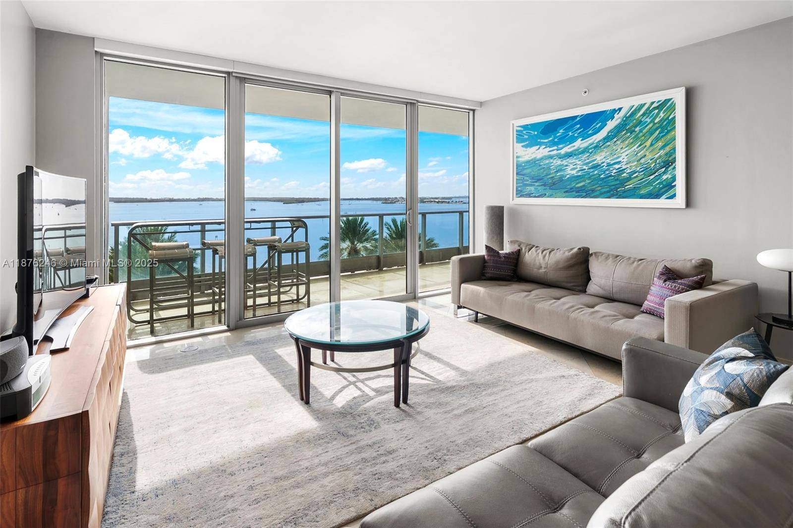 This spacious 1 bedroom residence showcases sweeping, unobstructed Biscayne Bay views through floor to ceiling glass and from an oversized private balcony ideal for outdoor dining and lounging.