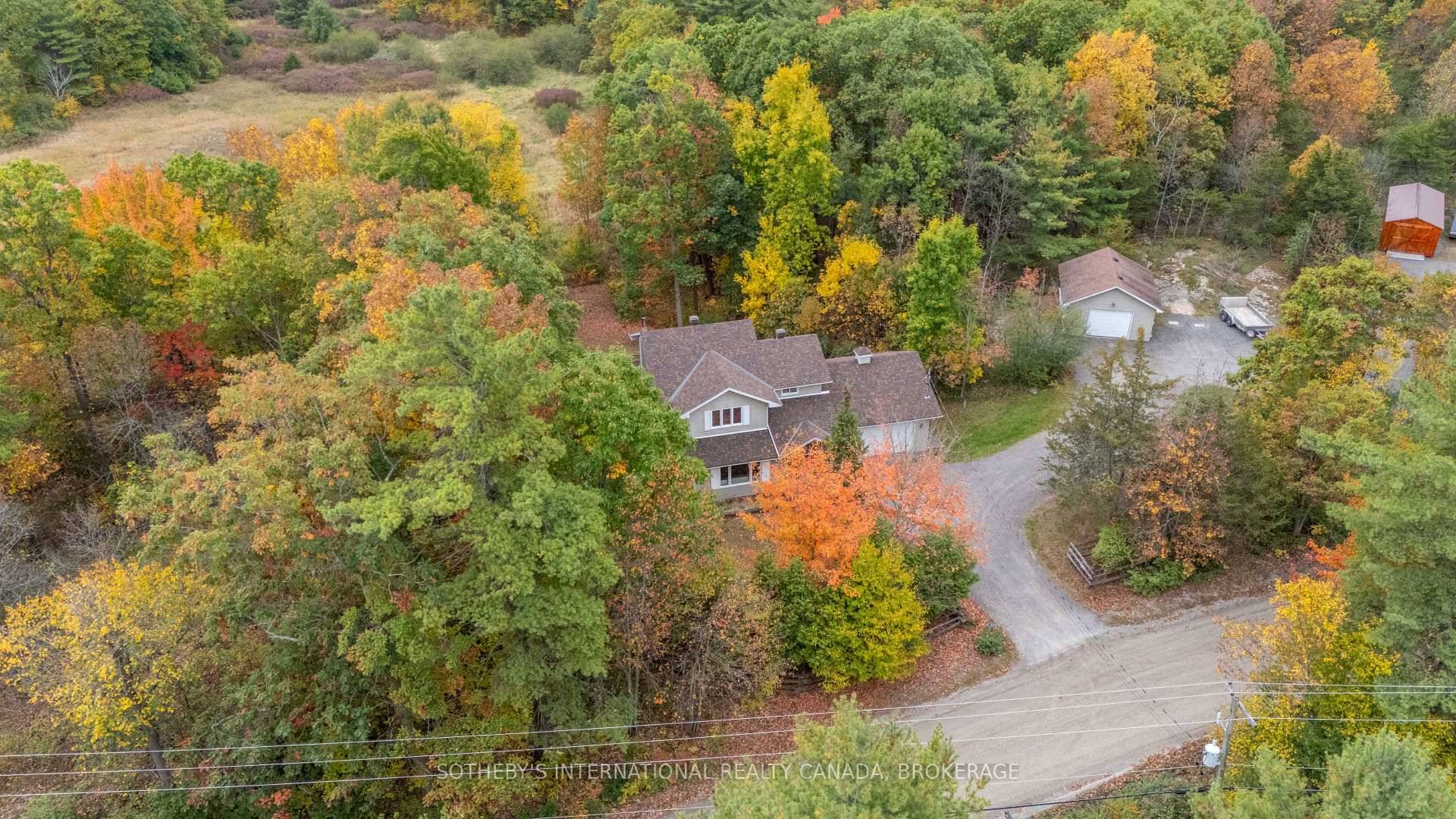Tucked within a canopy of mature trees along a peaceful country road, just minutes from one of the region's most enchanting waterfront villages, this impeccably maintained residence offers the rare ...