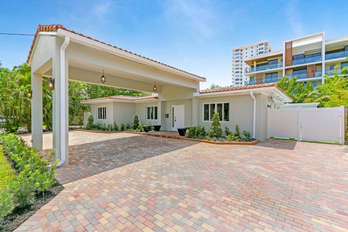 Welcome to 3025 Center Avenue, a beautifully renovated home just steps from Fort Lauderdale Beach.