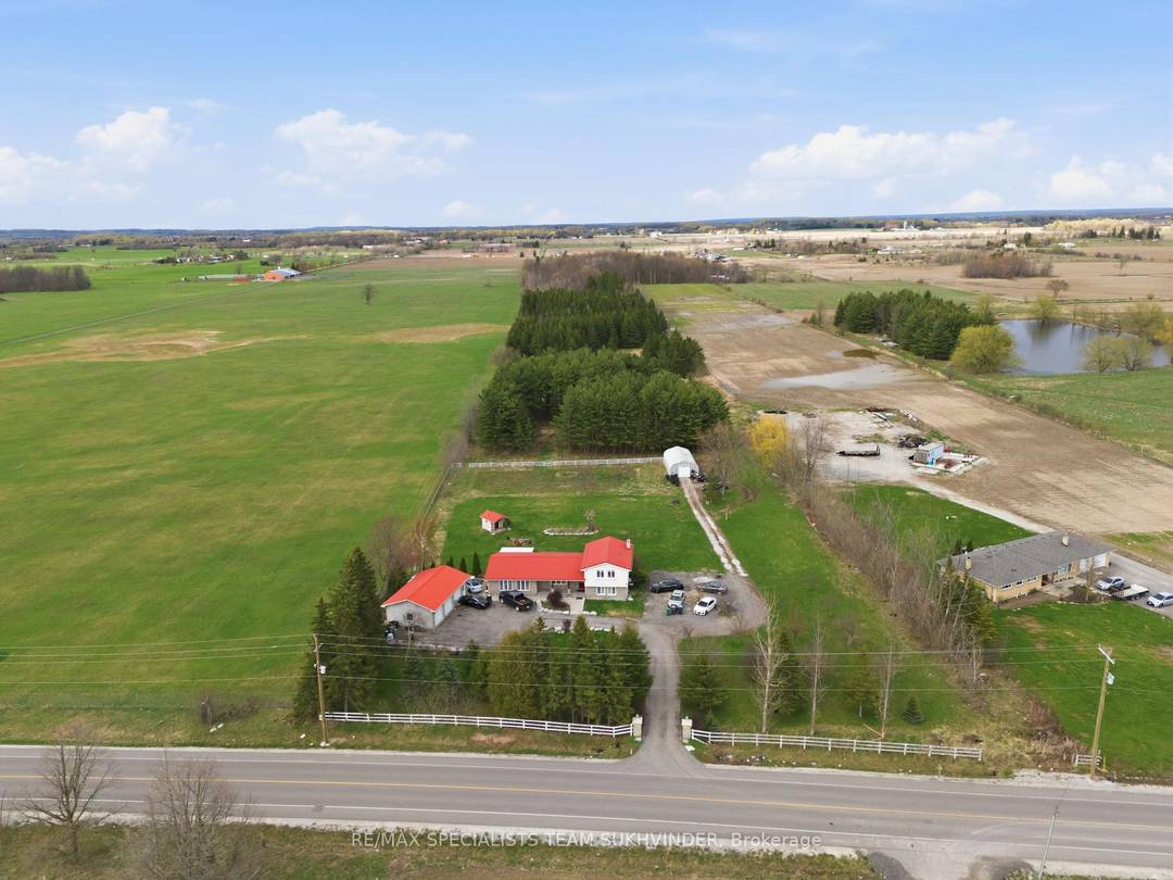 Welcome to this gated property at 14597 McLaughlin Rd in Caledon, offering the perfect blend of privacy and convenience just minutes from Brampton.