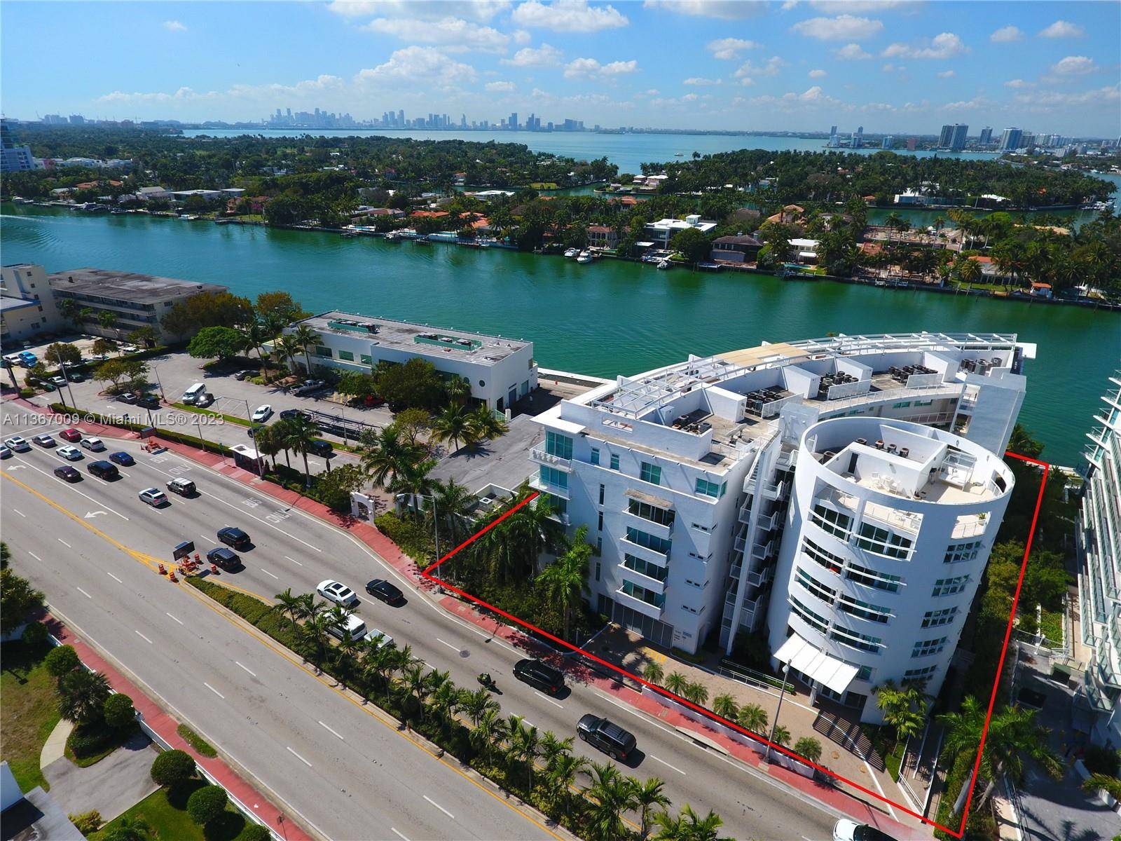 Boutique building, with concierge, new floors, freshly painted, washer dryer, new AC, new refrigerator and dishwasher, partial inter coastal water view from balcony, one covered parking space.