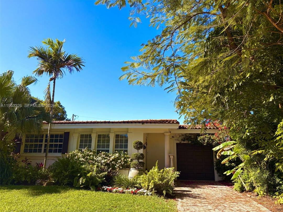 Coral Gables corner home located across the street from Coconut Grove and two blocks from Cocoplum's Circle.
