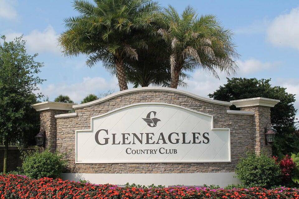 This stunning, FIRST FLOOR fully renovated TURNKEY condo offers modern living with an expansive golf course view.