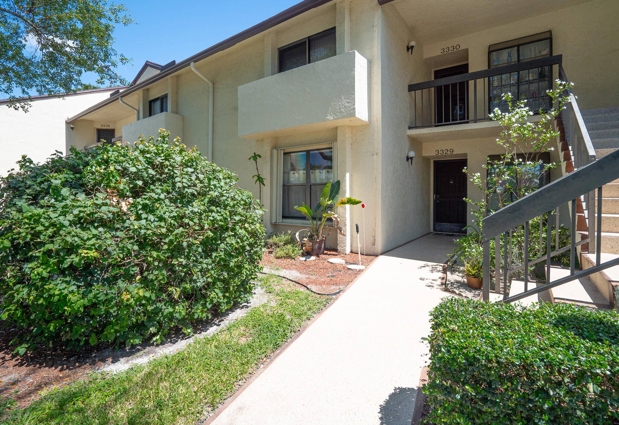Charming ground floor condominium with water and park like views offers a blend of comfort and convenience.