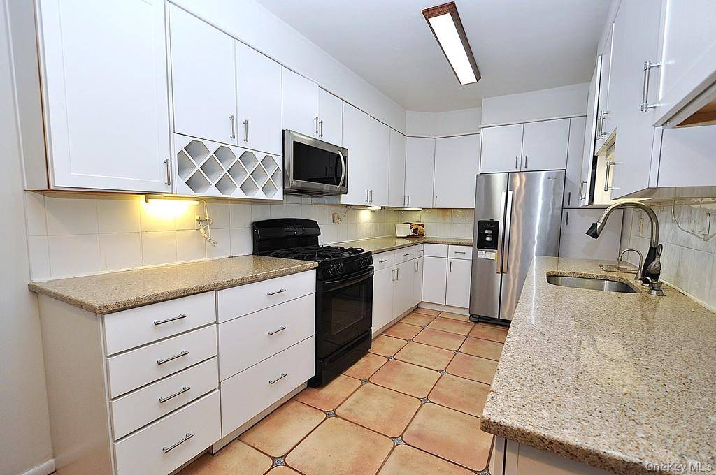 Elegant Corner Two Bedroom in one of Garth Road s Premier Co op.