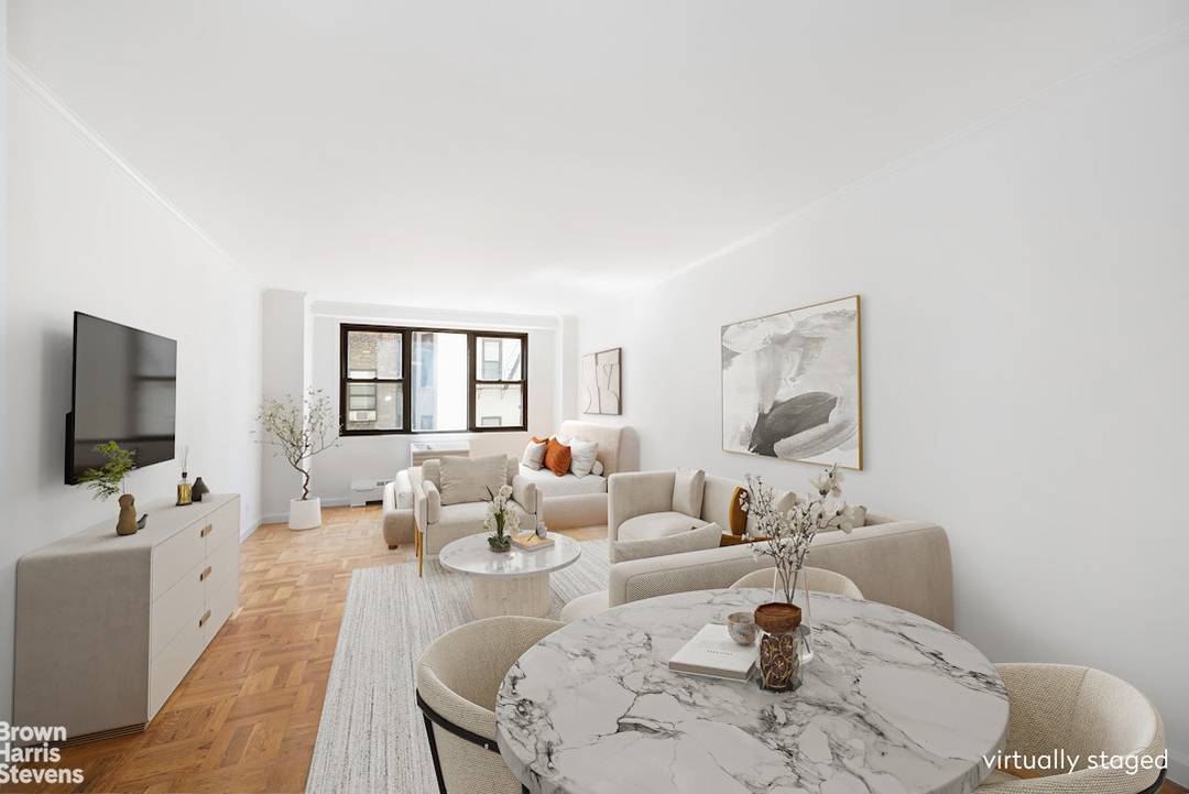Welcome to Apartment 5J at 230 East 15th Street, a sunlit, south facing quiet studio offering tasteful updates, generous storage, and a flexible layout in the historic Gramercy Park neighborhood.
