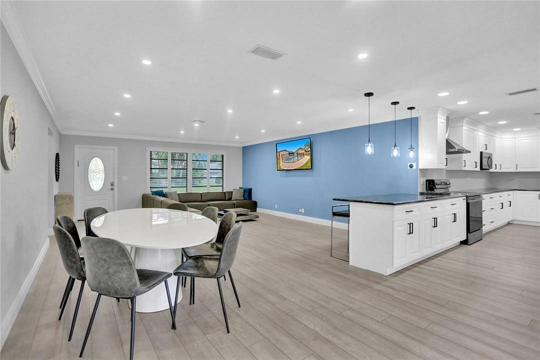 This bright and spacious fully furnished waterfront pool home has undergone a complete remodel, offering a luxurious living experience.