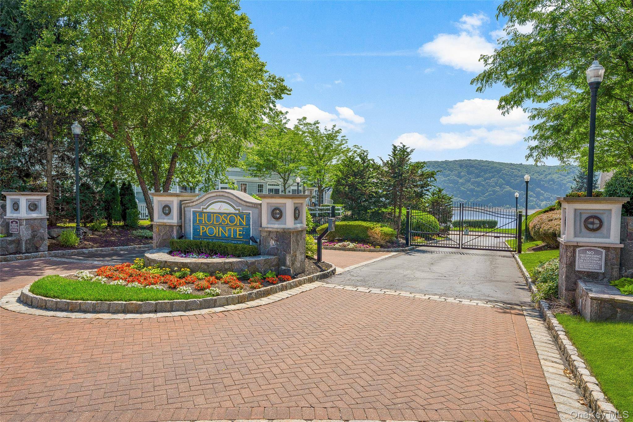 Luxury town home condo with SPECTACULAR RIVER VIEWS FROM ALMOST EVERY WINDOW in a stunning gated community.