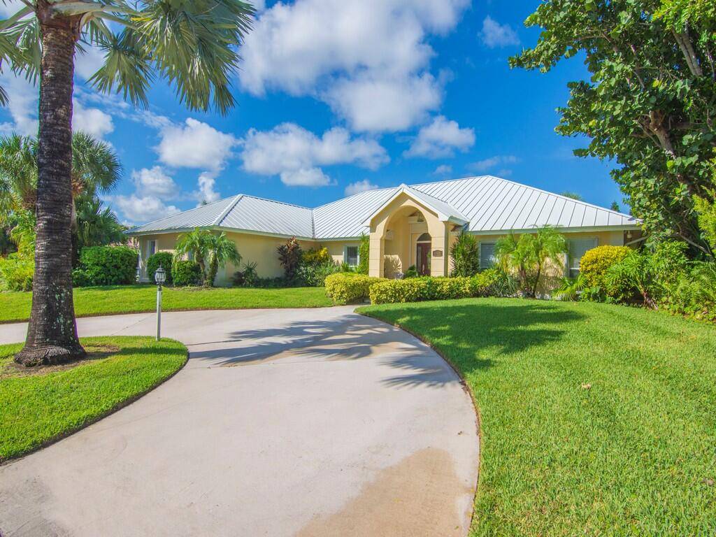 This beautifully maintained home is located in the exclusive guard gated community of Castaway Cove, just a block from a secluded, wide private beach and close to town.
