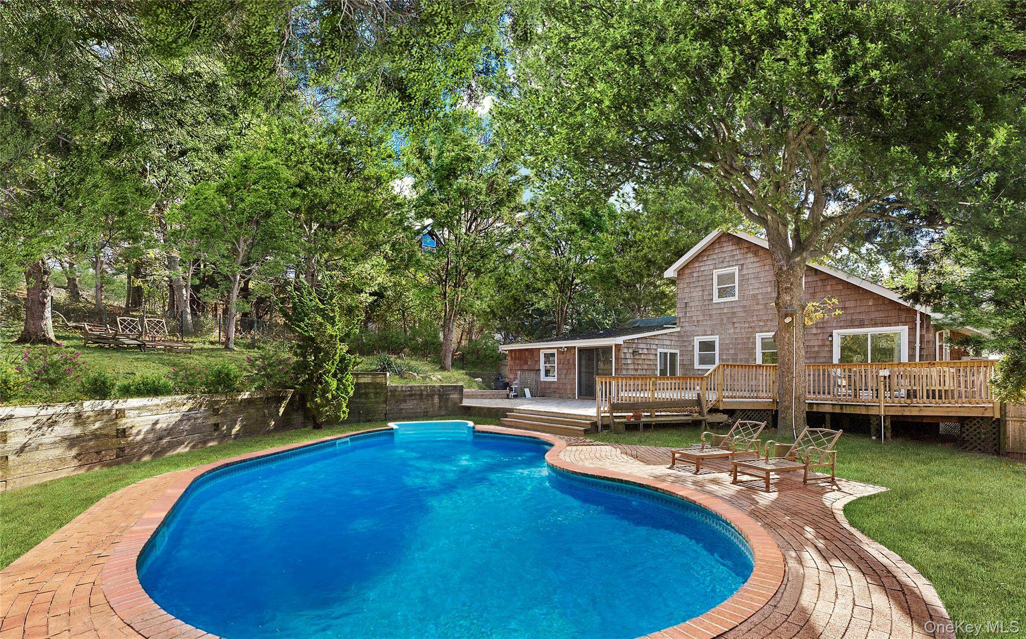 Just 600 feet from Shinnecock Bay, this well appointed cottage is designed for effortless living.