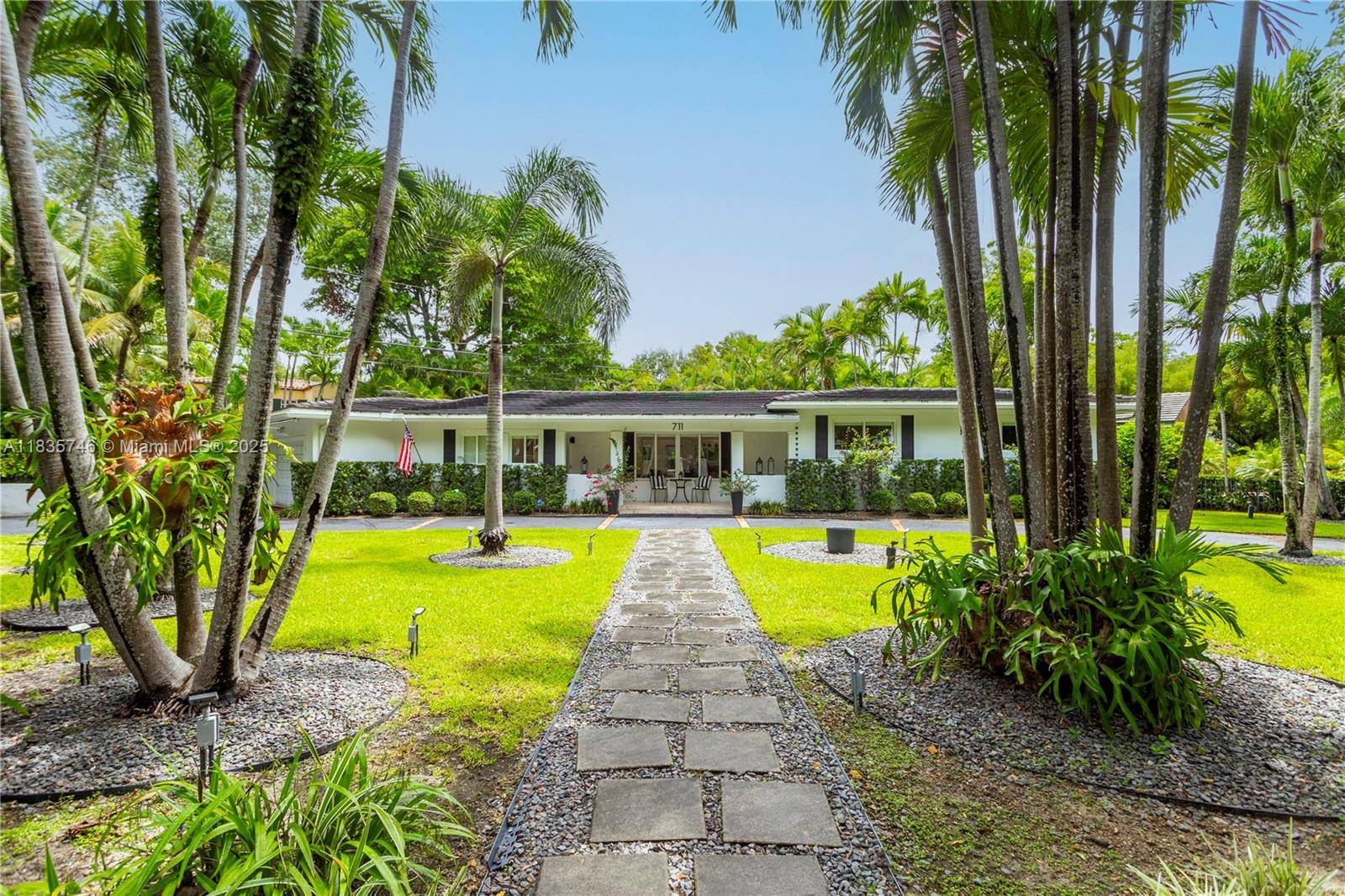 Beautifully Renovated South Gables home with LARGE entertaining spaces on a spacious 12, 700 SF corner lot !
