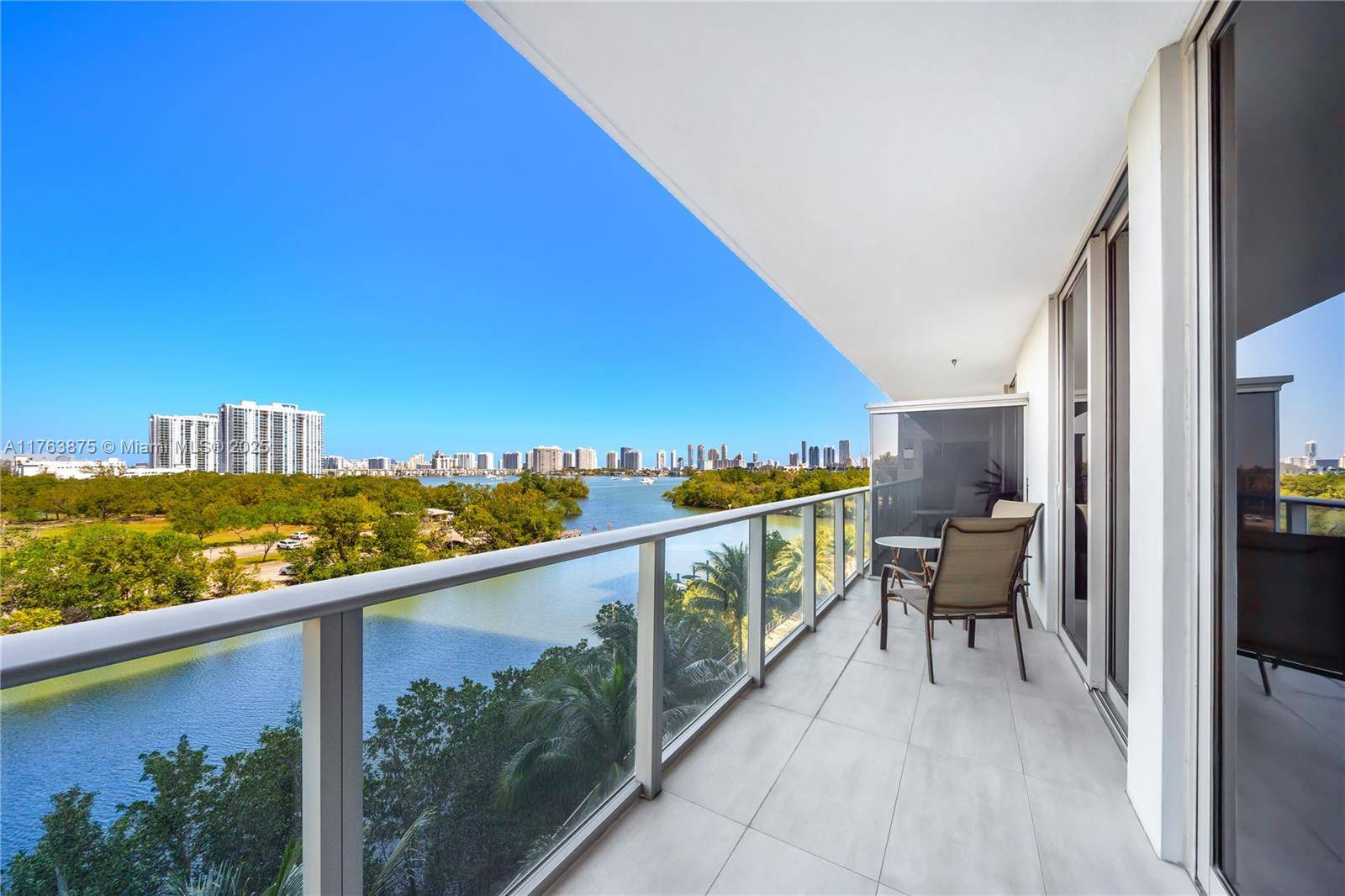 Stunning newly built residence overlooking the natural beauty of Oleta River State Park.