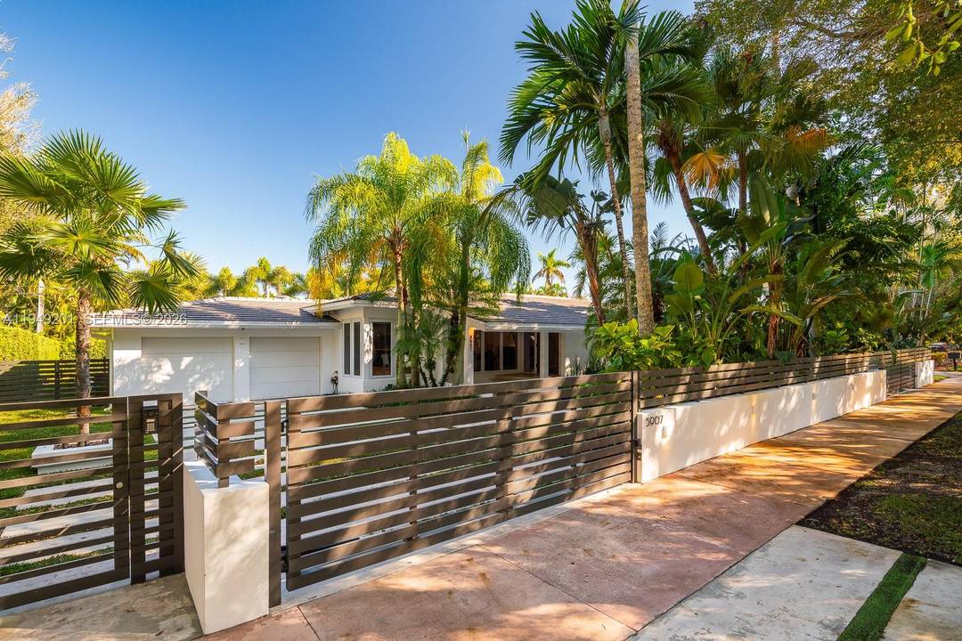 Elegant, architecturally refined one story residence situated on an expansive 12, 000 square foot lot along prestigious Riviera Drive in Coral Gables.