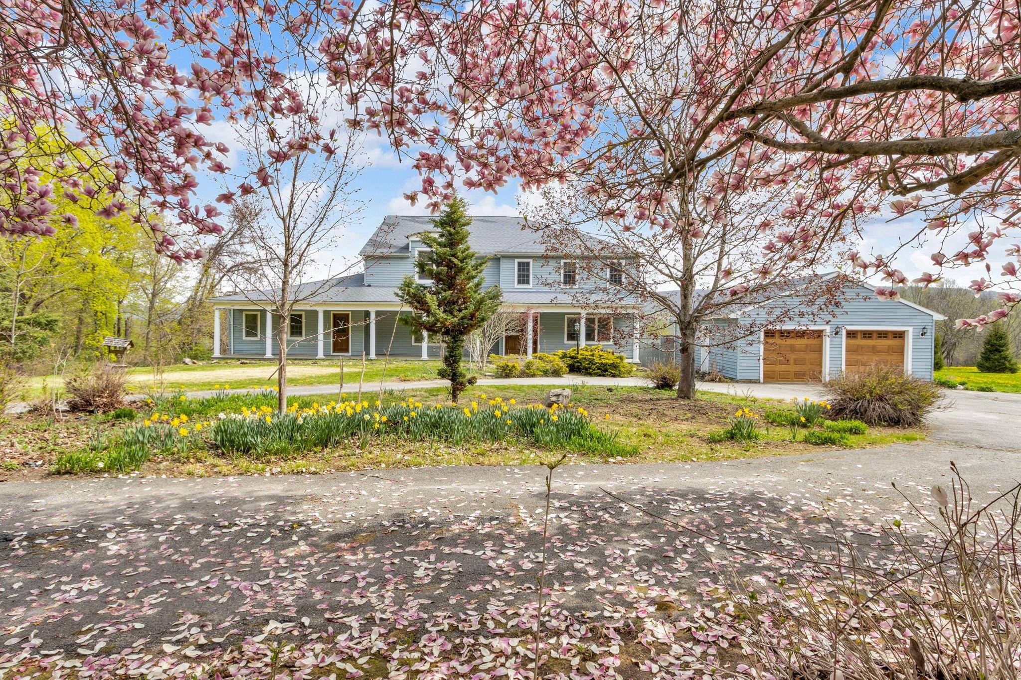 Set on a quiet and scenic lot in Patterson, NY, this expansive 4 bedroom, 3.