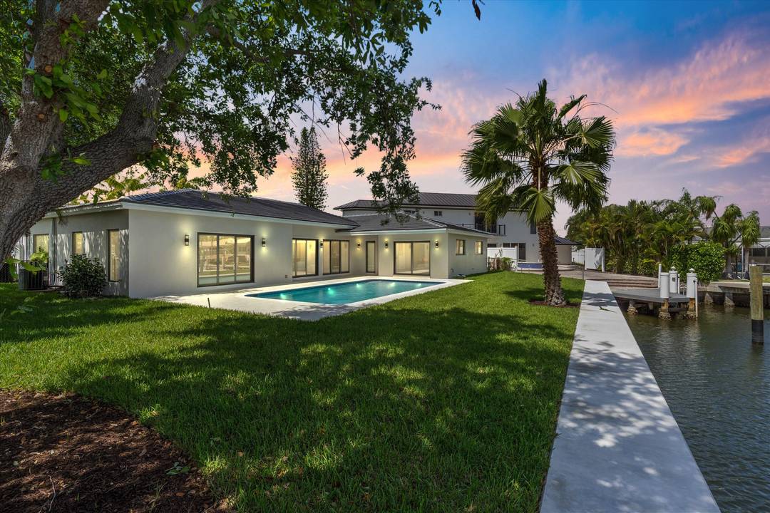 Stunning modern waterfront residence in The Landings of Fort Lauderdale, completely renovated and expanded by a luxury builder.