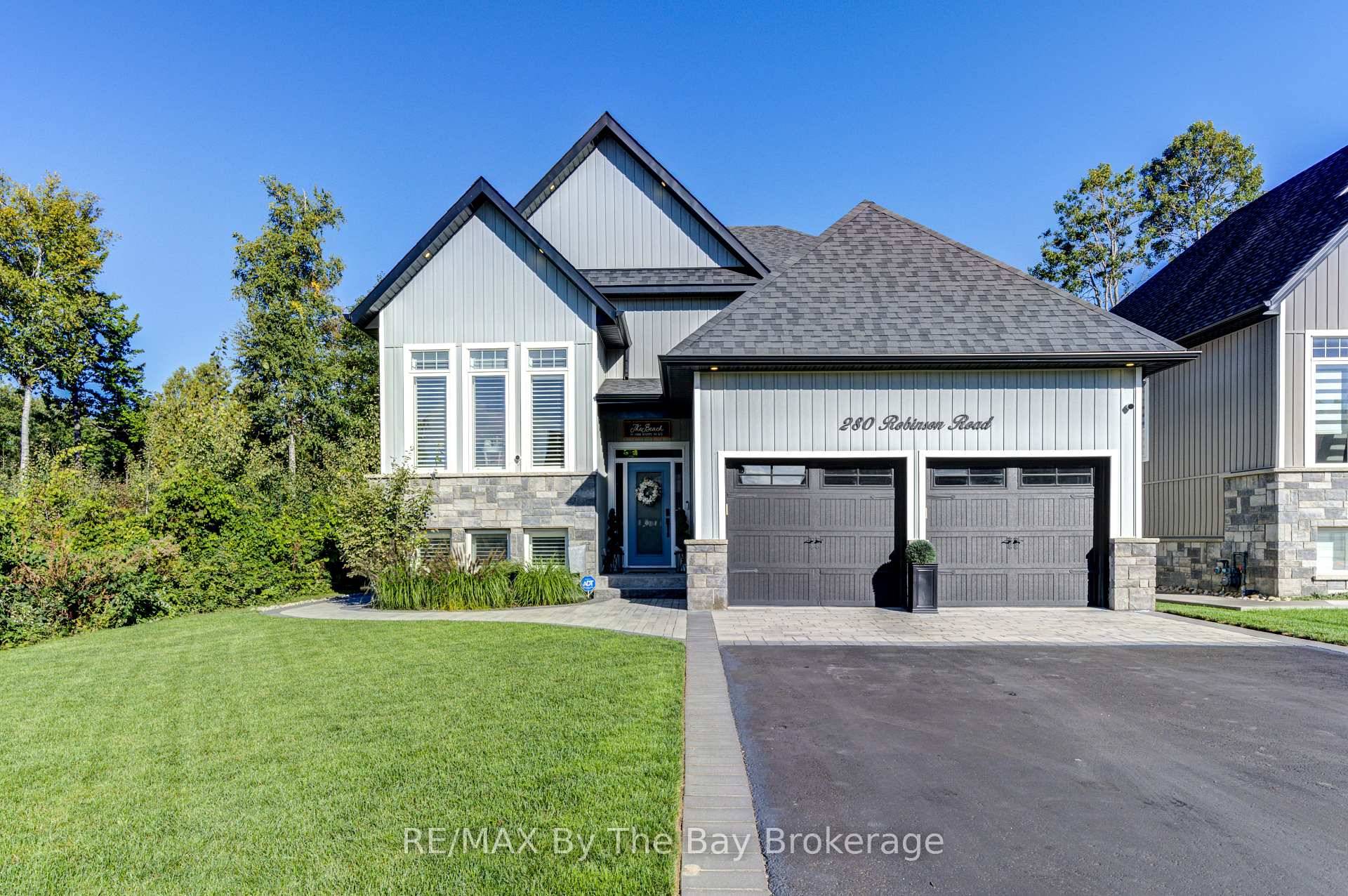 This custom built 4 bedroom, 3 bathroom bungalow offers modern comfort and versatile living spaces.