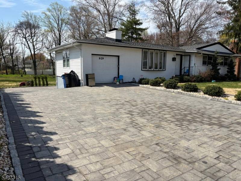 COZY RANCH WITH HUGE YARD 145X331, WALKOUT FINISHED BASEMENT, BEAUTIFUL PAVER DRIVEWAY, PARKING AND PATIO, 2 WOOD BURN FIREPLACES, HARD WOOD FLOOR ON MAIN LEVEL.