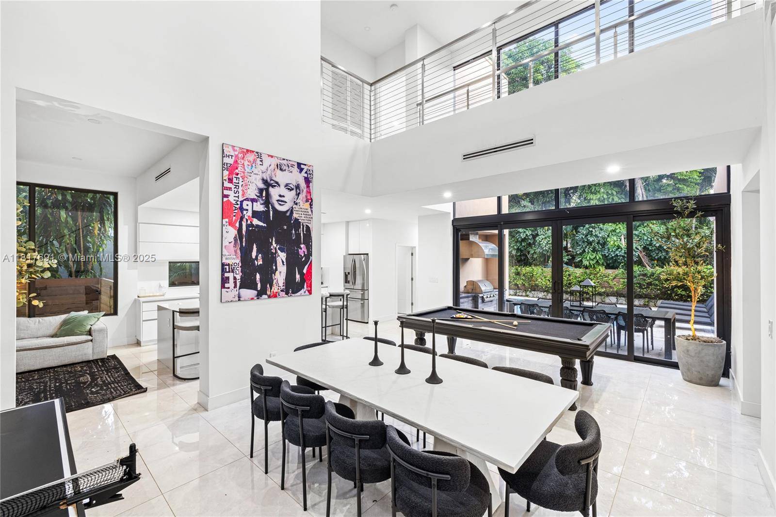 Experience the elegance of this stunning contemporary 4 bedroom, 4 bathroom home, just moments away from the vibrant Coconut Grove and Brickell.