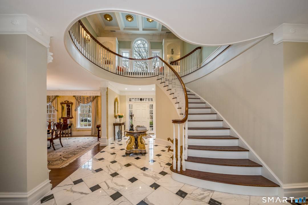 Set on 5. 65 secluded acres in the heart of Madison, this exceptional English Georgian custom home offers a rare blend of timeless architecture, refined craftsmanship, and natural beauty.
