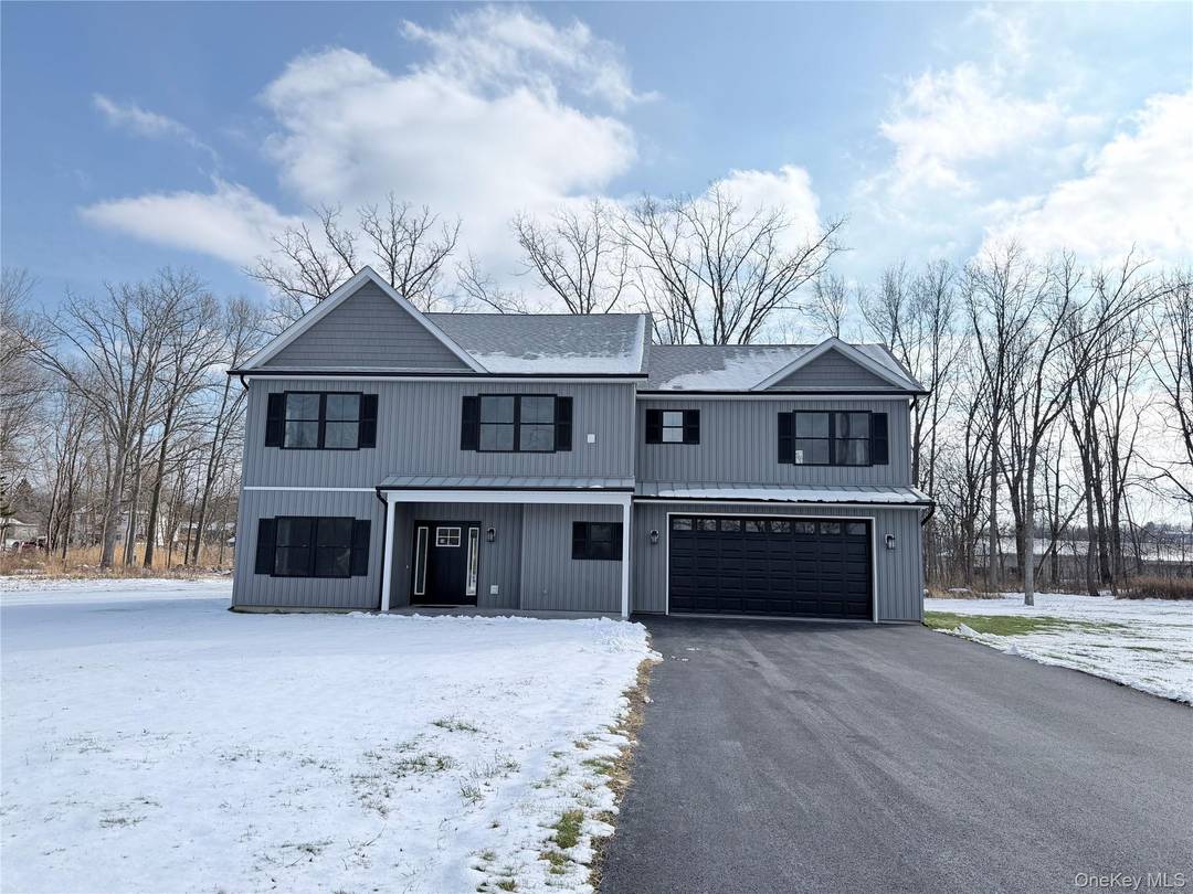 Welcome to Bigert Drive, a beautifully crafted new construction colonial home offering 4 spacious bedrooms and 2.