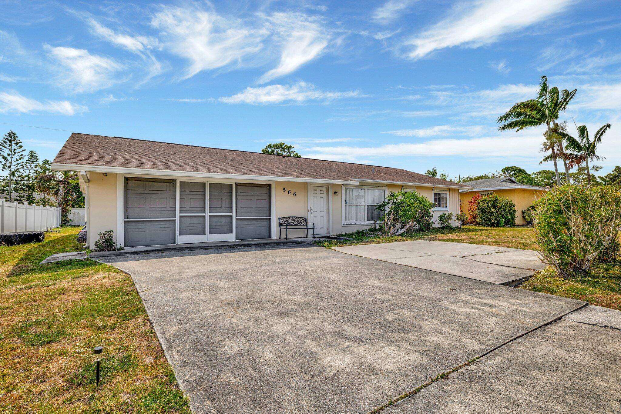 Eight Feet Deep Gigantic Pool, Large Screened In Patio, 3 Bedroom, 2 Bathroom Home, Open Floor Plan, Tile Through Out.