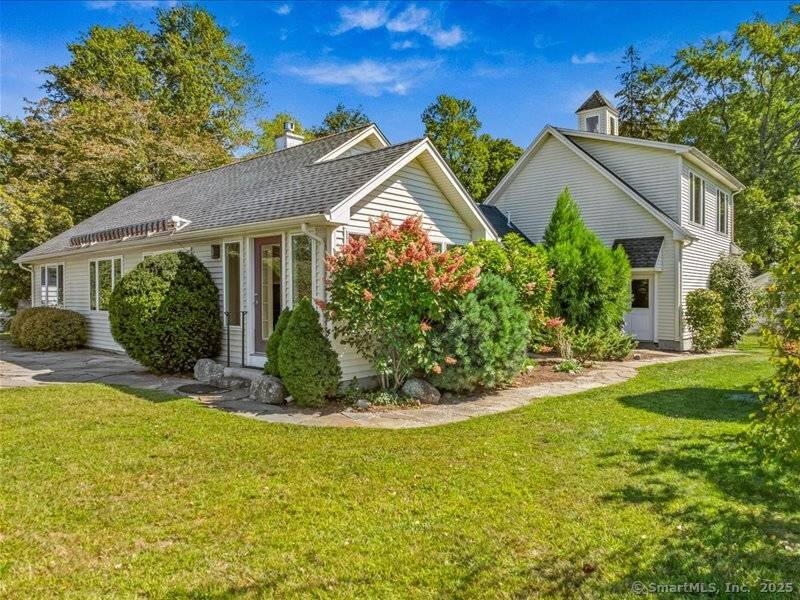 Lakefront living meets New England charm in this beautifully remodeled 3 bedroom, 2 bathroom home on desirable Rogers Lake in historic Old Lyme, CT.