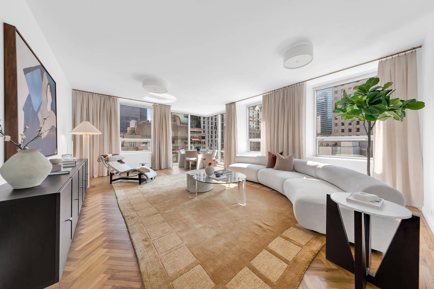 Spacious Corner One Bedroom at White Glove Condo Next to MoMA Located in a premier white glove condominium adjacent to the Museum of Modern Art, this oversized one bedroom residence ...