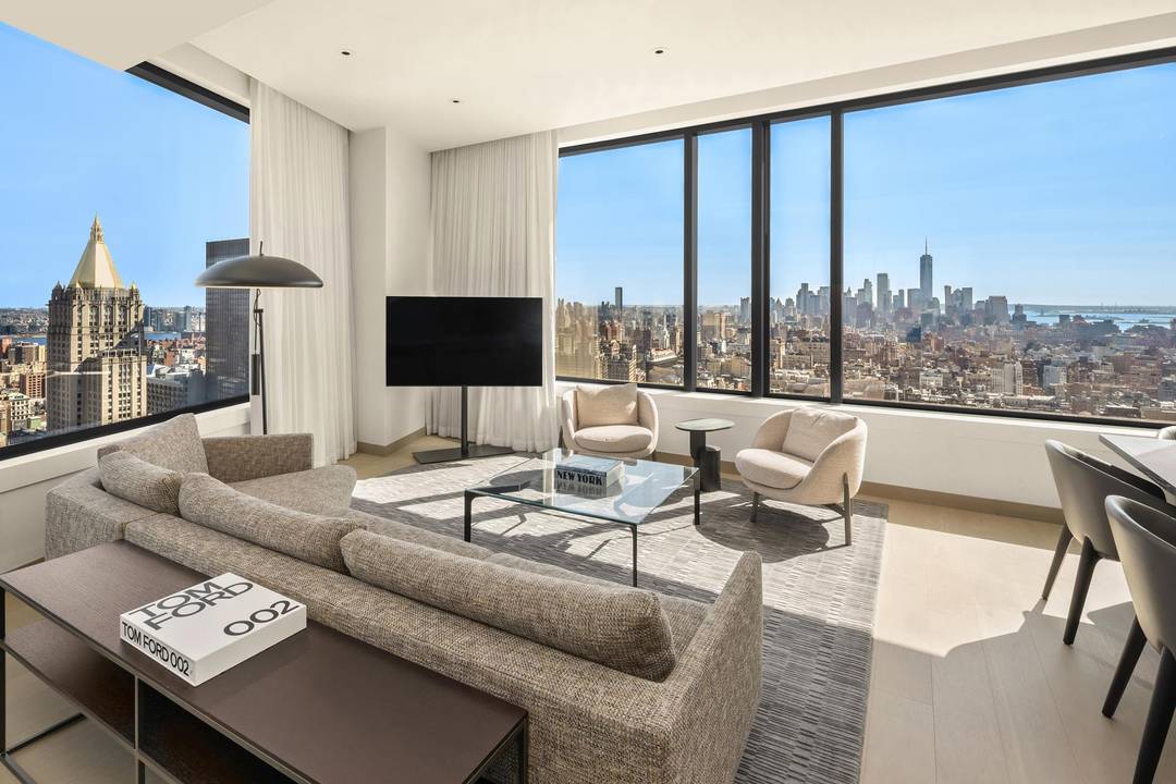 THE TROPHY ON TOP Perched over 500 feet above Manhattan's skyline on the highest residential floor of The Ritz Carlton NoMad, this stunning 2 bedroom, 2.