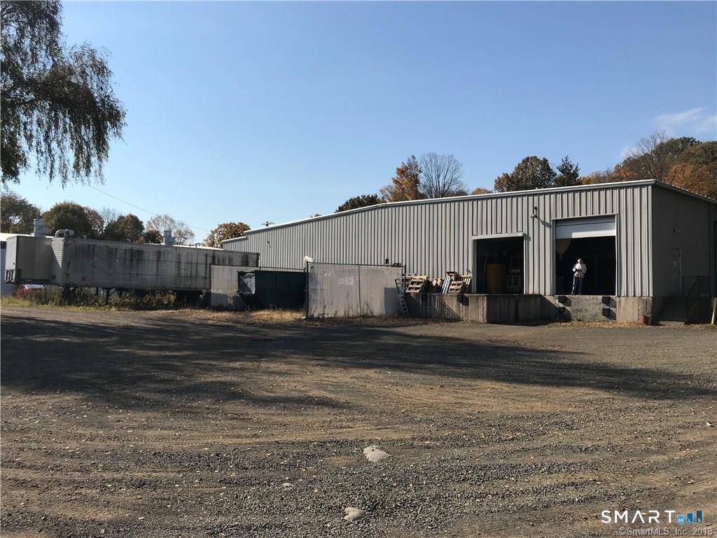 Excellent opportunity to acquire a 13, 464 SF two tenant light industrial building situated on 1.
