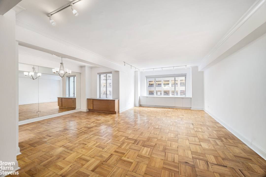 Apartment 7K at 200 East 57th Street is a spacious two bedroom, two bathroom home in a prime, full service co op.