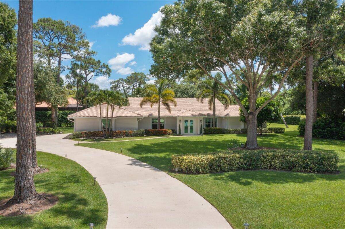 Exquisite Coastal Retreat in Reserve Plantation at PGA Village.