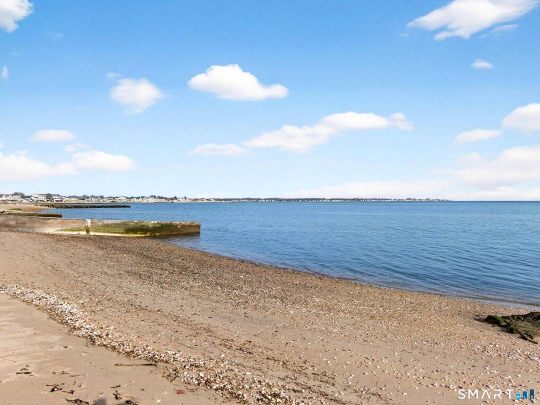 A rare opportunity to own a truly special year round waterfront retreat with its own private sandy beach and breathtaking, unobstructed views of Long Island Sound.